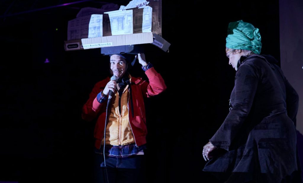 Performers engaging in a symbolic ritual during a bespoke celebration of life