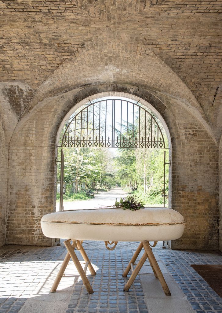 Loop Tech Mycelium Living Cocoon coffin in entrance of Abney Park Chapel