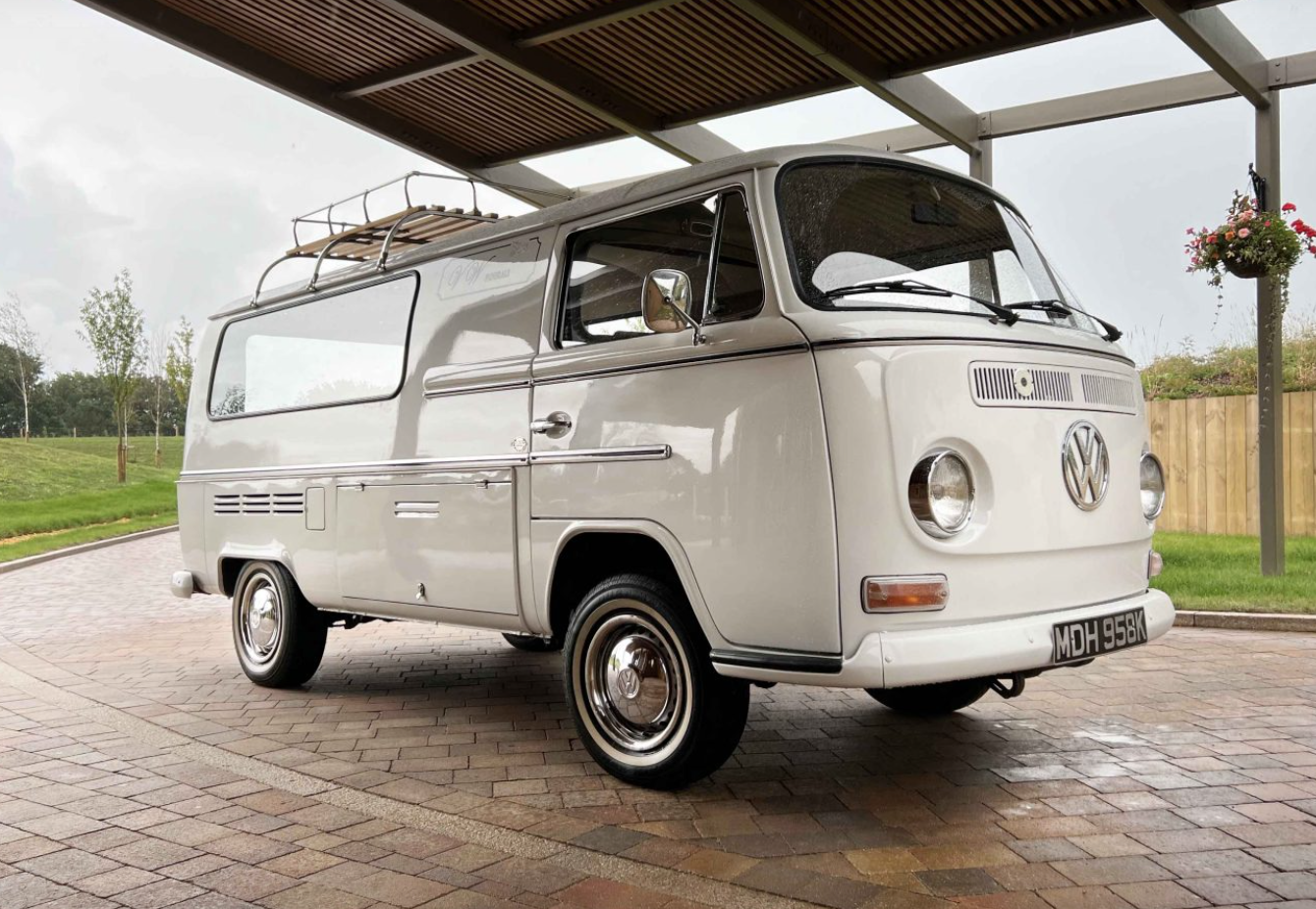 White VW Camper Van hearse with roof rack