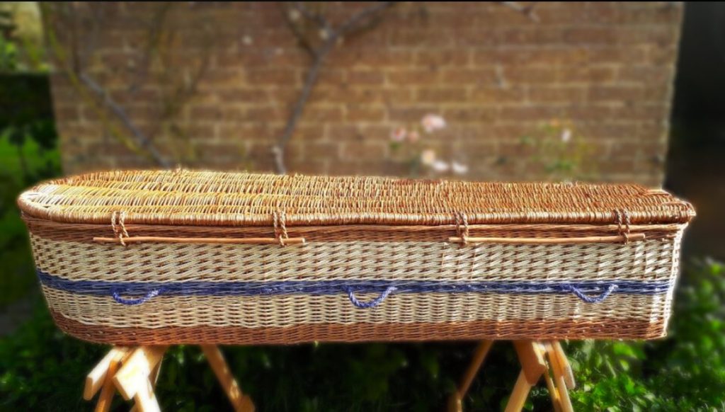 Wild Heather Wicker Coffin. Natural wicker with blue trim