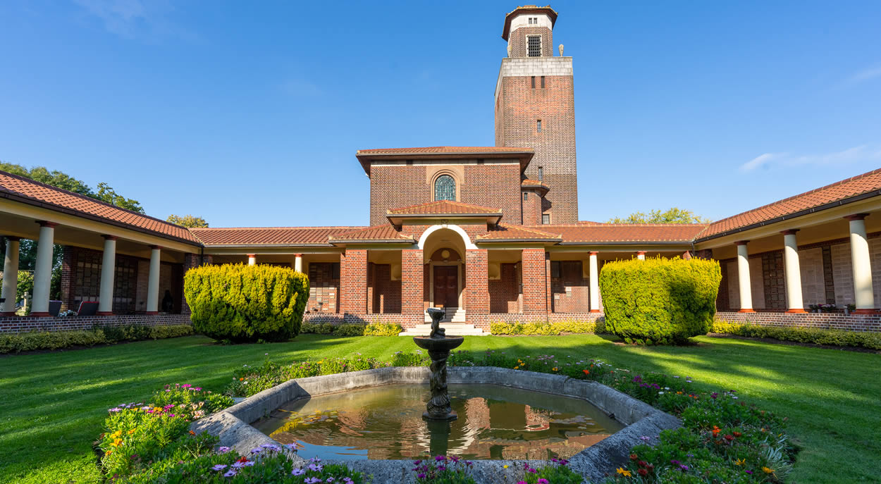St Marylebone Crematorium, London N2 Traditional 1930's building under bright blue skies