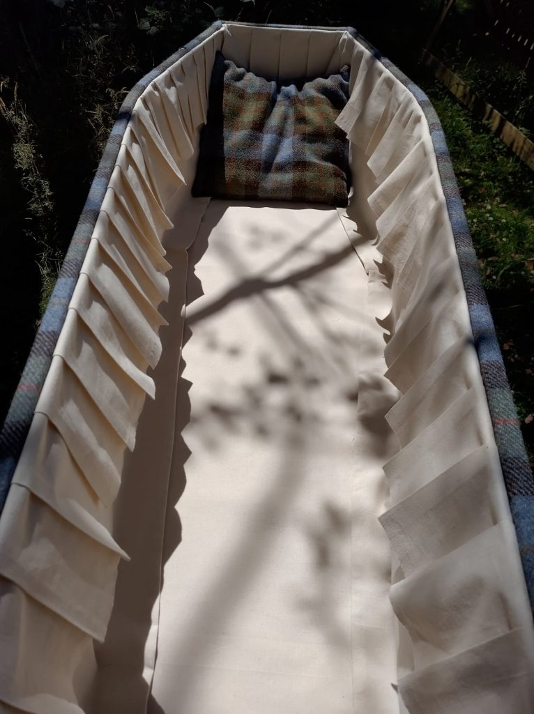 Interior of Harris Tweed coffin with trim made by The Woollen Cwtch Company.