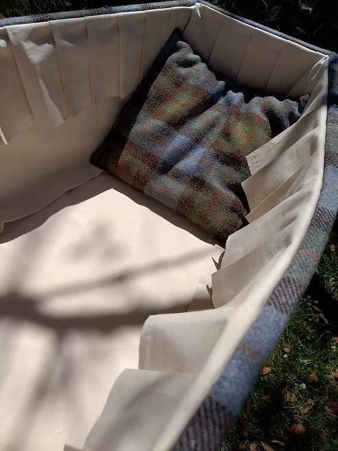Interior of Harris Tweed Sustainable Coffin with matching pillow made by The Woollen Cwtch Company
