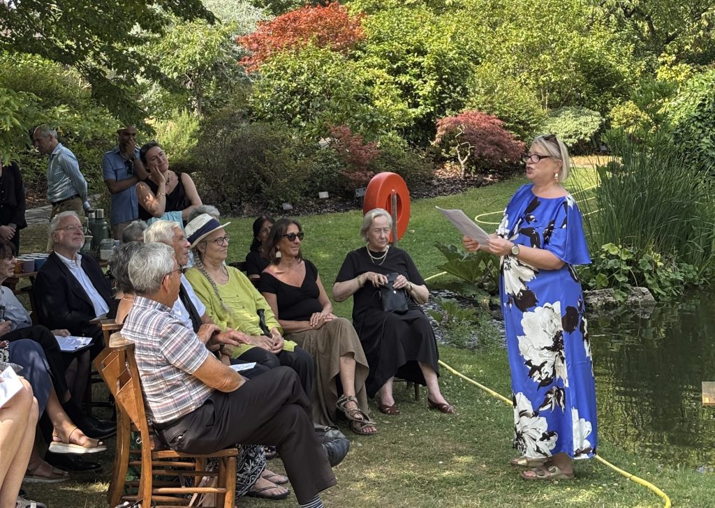 Alternative Cremation funeral ceremony, outside in the gardens at Golders Green Crematorium