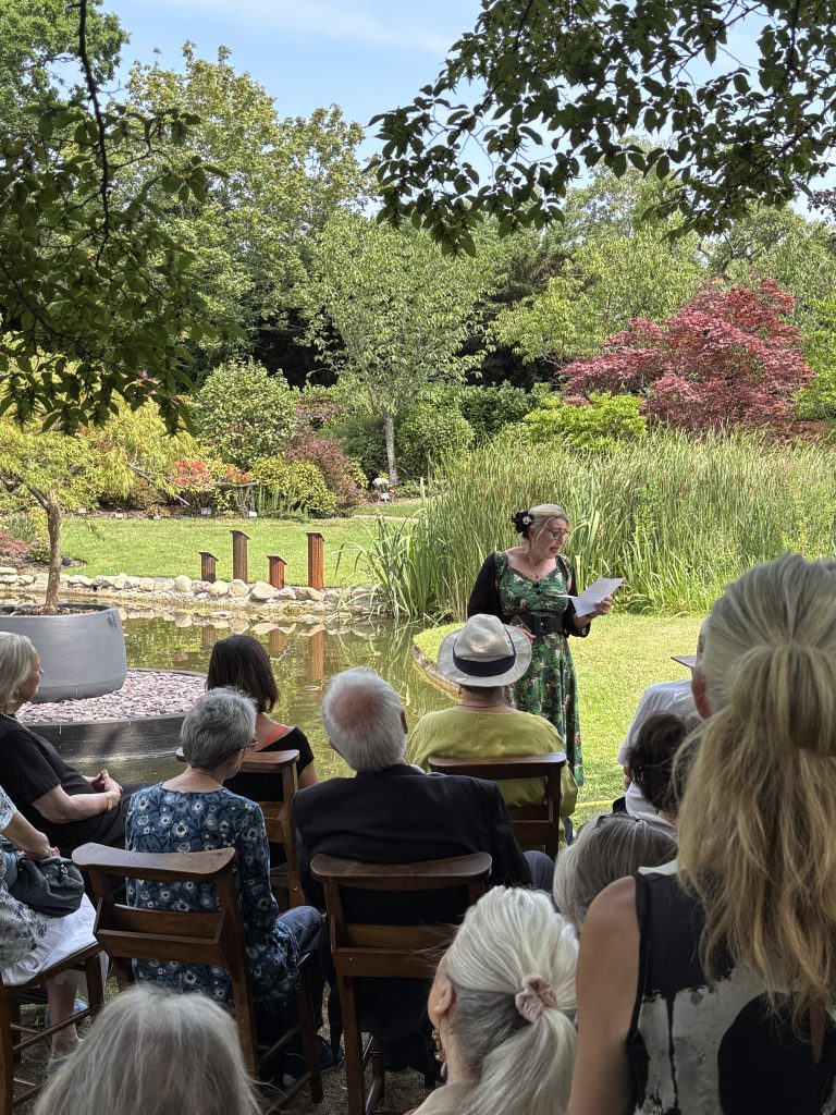 Alternative Cremation funeral ceremony, outside in the gardens at Golders Green Crematorium